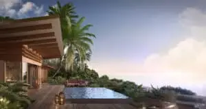 Luxuriöse Strandvilla mit Pool, Palmen und Meerblick bei Sonnenuntergang